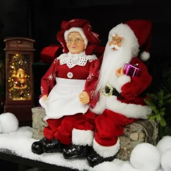 Mr & Mrs Claus with Presents Sitting on Log Christmas Ornament Christmas Ornaments|