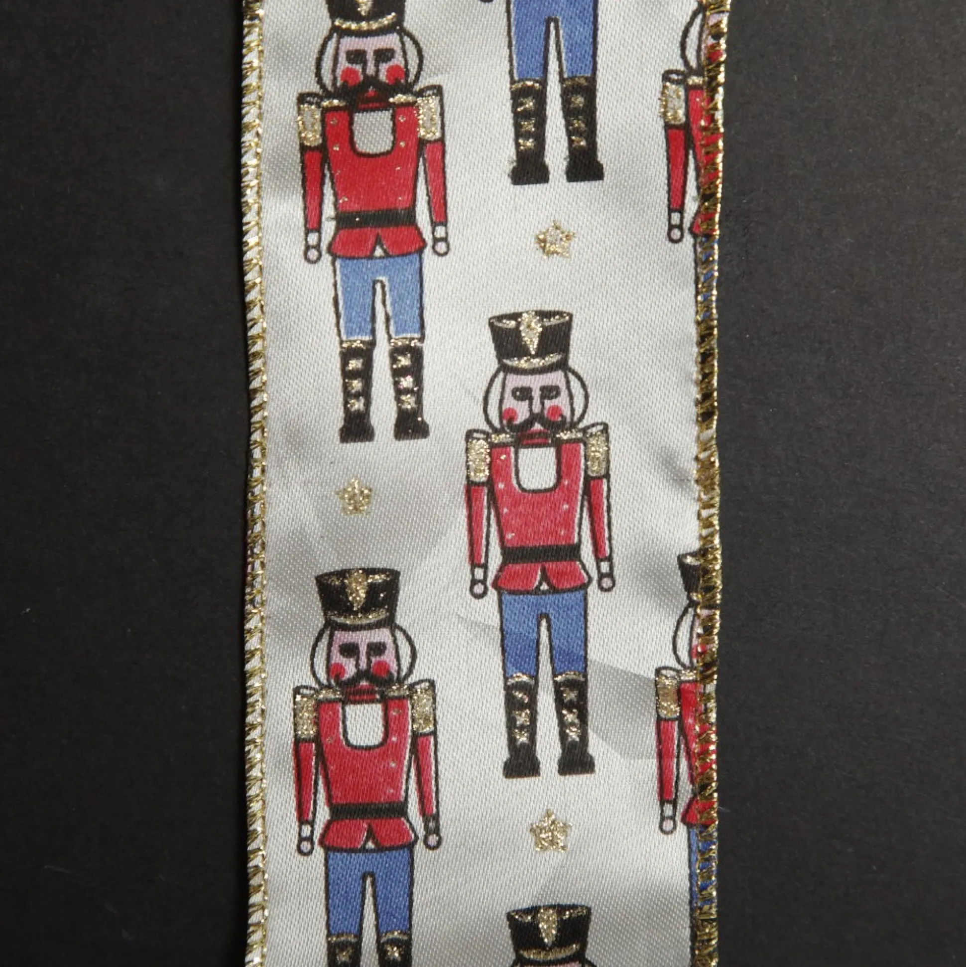 White Satin Ribbon with Blue and Red Nutcracker Print Ribbons|