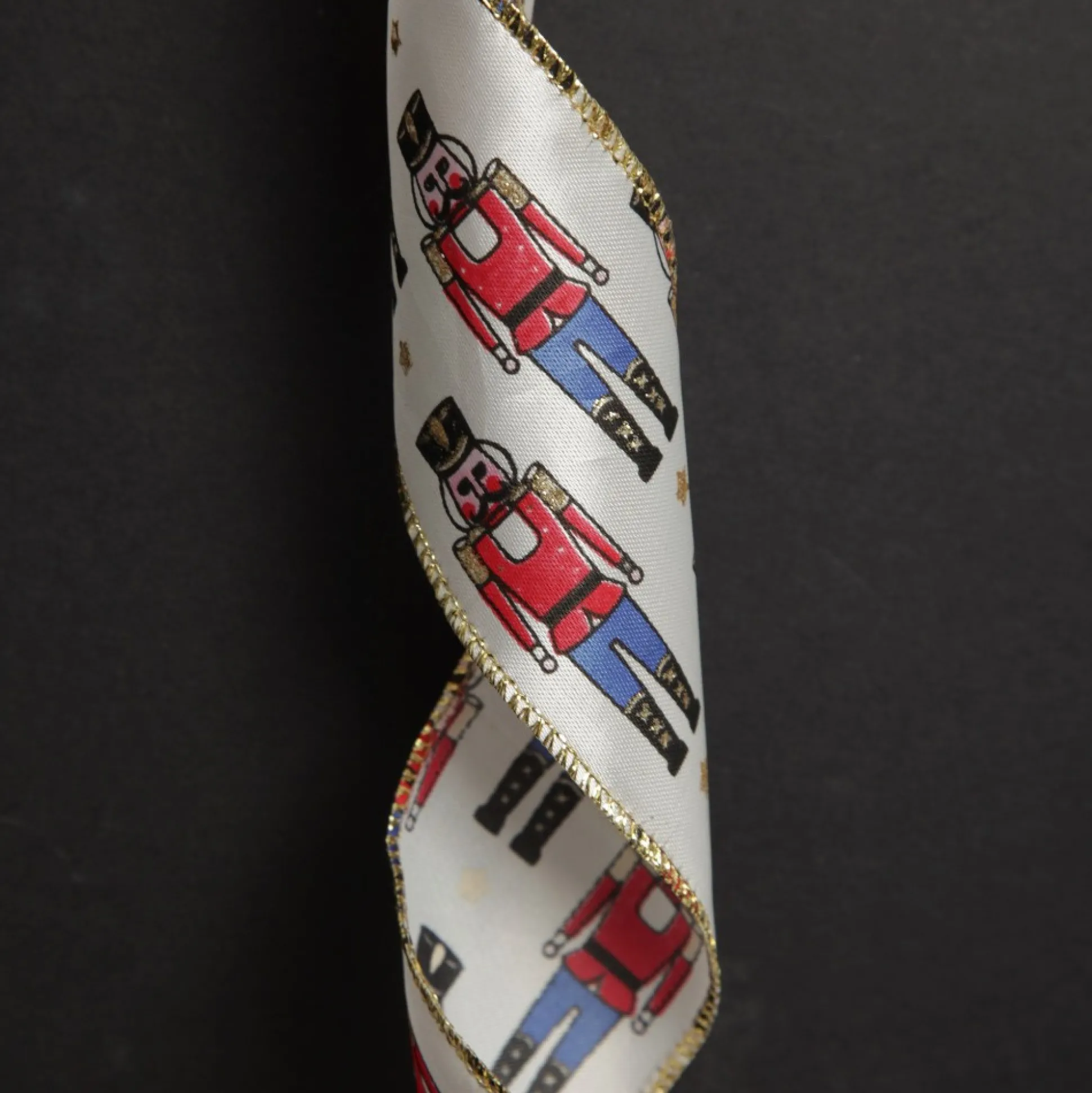 White Satin Ribbon with Blue and Red Nutcracker Print Ribbons|